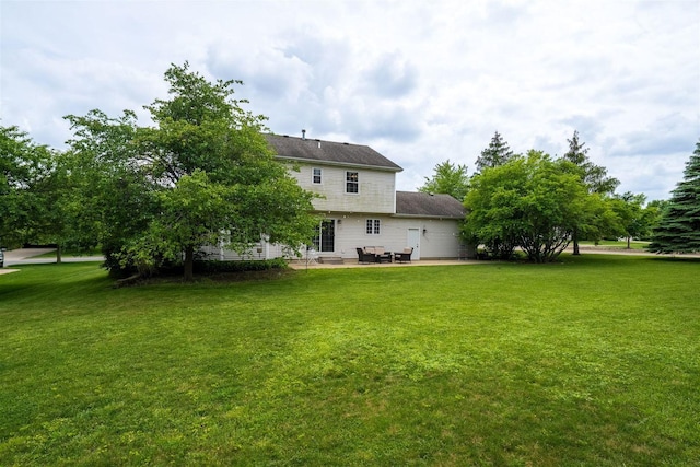 1098 Ironwood Cc Dr, Normal, IL 61761 - rear view of house featuring a patio area and a yard