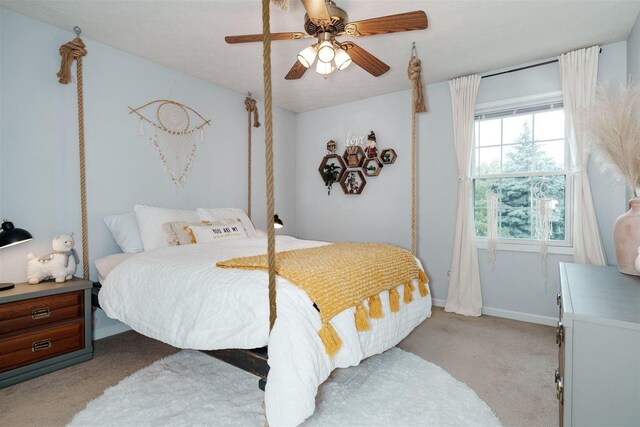 1098 Ironwood Cc Dr, Normal, IL 61761 - bedroom with light carpet and a ceiling fan