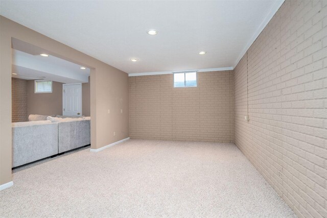1098 Ironwood Cc Dr, Normal, IL 61761 - below grade area with brick wall, recessed lighting, and carpet floors
