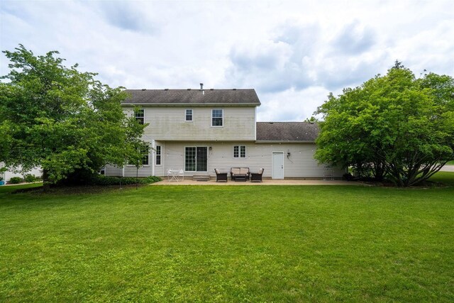 1098 Ironwood Cc Dr, Normal, IL 61761 - back of house featuring a patio area, a yard, and an outdoor hangout area