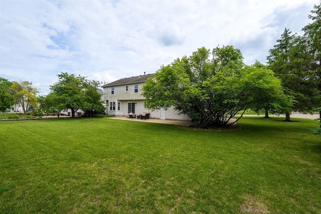 1098 Ironwood Cc Dr, Normal, IL 61761 - view of green lawn with a patio area