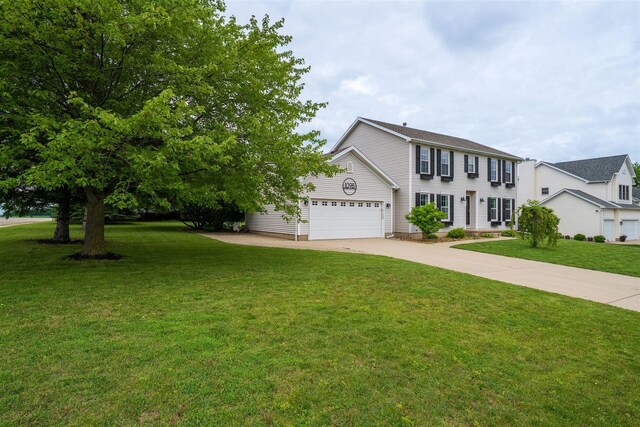 1098 Ironwood Cc Dr, Normal, IL 61761 - colonial home with driveway, a front lawn, and a garage
