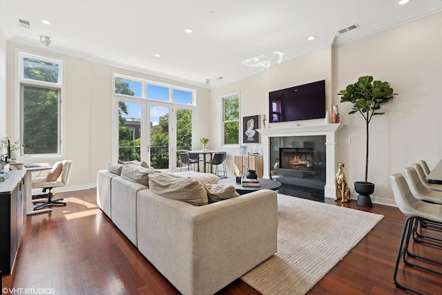 1051 N Hermitage Ave Unit 3, Chicago, IL 60622 - living room with crown molding, dark wood-style flooring, a fireplace with flush hearth, and recessed lighting