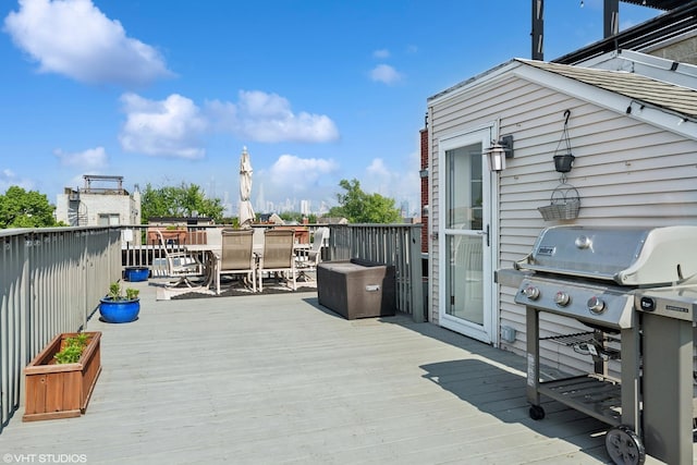 1051 N Hermitage Ave Unit 3, Chicago, IL 60622 - wooden deck with outdoor dining space and area for grilling