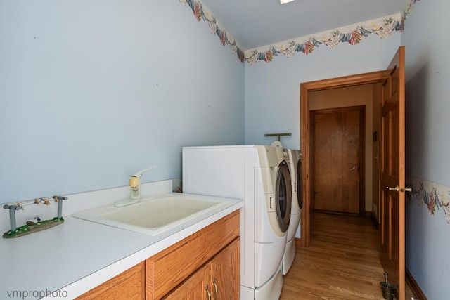 1771 Andrew Ct, Long Grove, IL 60047 - washroom featuring washing machine and dryer, light wood-type flooring, and cabinet space