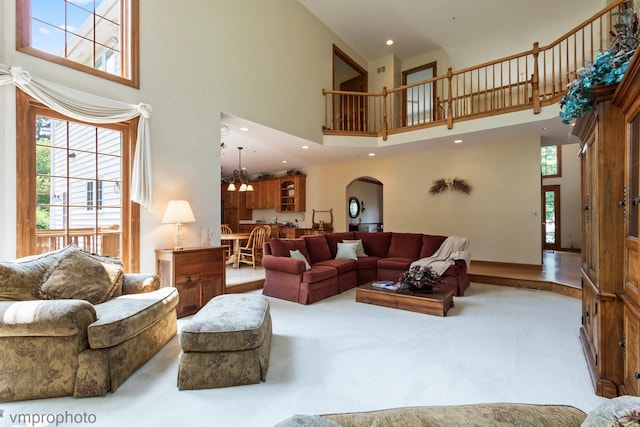 1771 Andrew Ct, Long Grove, IL 60047 - carpeted living room featuring a high ceiling, arched walkways, and recessed lighting