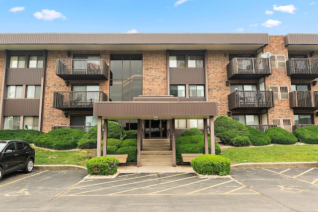 1420 Woodbridge Rd Unit 3C, Joliet, IL 60436 - view of apartment building / complex featuring uncovered parking