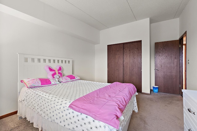 1420 Woodbridge Rd Unit 3C, Joliet, IL 60436 - bedroom with carpet floors, a closet, and a textured ceiling