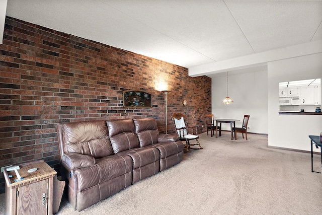 1420 Woodbridge Rd Unit 3C, Joliet, IL 60436 - living area with light carpet, beam ceiling, and brick wall