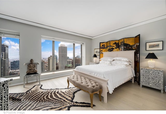 950 N Michigan Ave Unit 2901, Chicago, IL 60611 - bedroom featuring light wood-style floors and a view of city