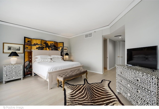 950 N Michigan Ave Unit 2901, Chicago, IL 60611 - bedroom featuring crown molding and light wood-style flooring