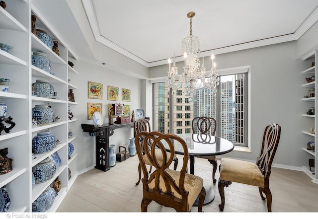950 N Michigan Ave Unit 2901, Chicago, IL 60611 - dining space with a chandelier and light wood-style flooring