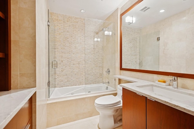 800 N Michigan Ave Unit 3103, Chicago, IL 60611 - bathroom with vanity, tiled shower / bath, tile patterned flooring, and tile walls