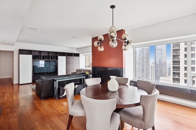 800 N Michigan Ave Unit 3103, Chicago, IL 60611 - dining area with wood finished floors and healthy amount of natural light