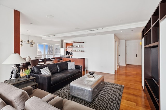 800 N Michigan Ave Unit 3103, Chicago, IL 60611 - living room with light wood finished floors, a chandelier, and recessed lighting