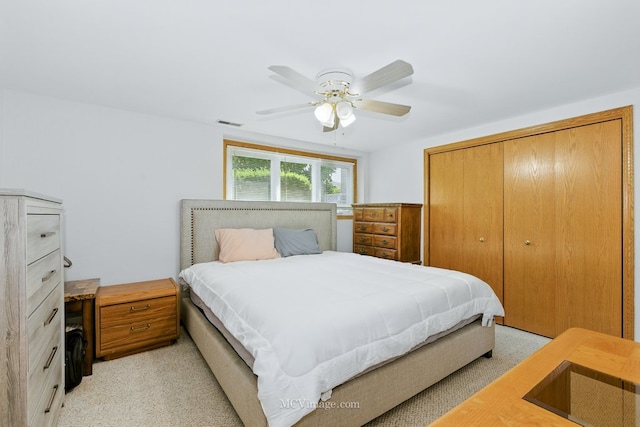 10935 Barbs Way, Orland Park, IL 60467 - bedroom featuring a closet, light colored carpet, and ceiling fan