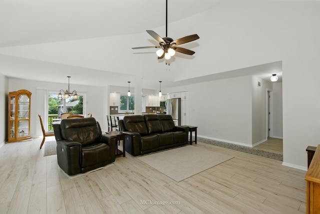 10935 Barbs Way, Orland Park, IL 60467 - living room with light wood-style floors, a ceiling fan, a chandelier, and high vaulted ceiling