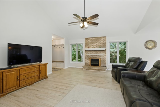 10935 Barbs Way, Orland Park, IL 60467 - living room with a ceiling fan, light wood-type flooring, high vaulted ceiling, and a fireplace