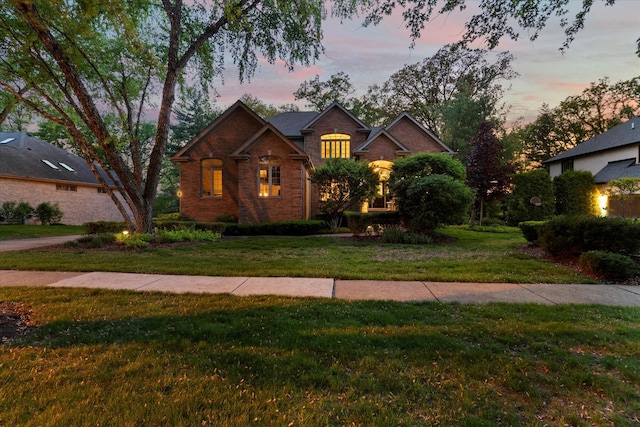 1396 Notre Dame Dr, Lemont, IL 60439 - traditional-style house with a lawn and brick siding