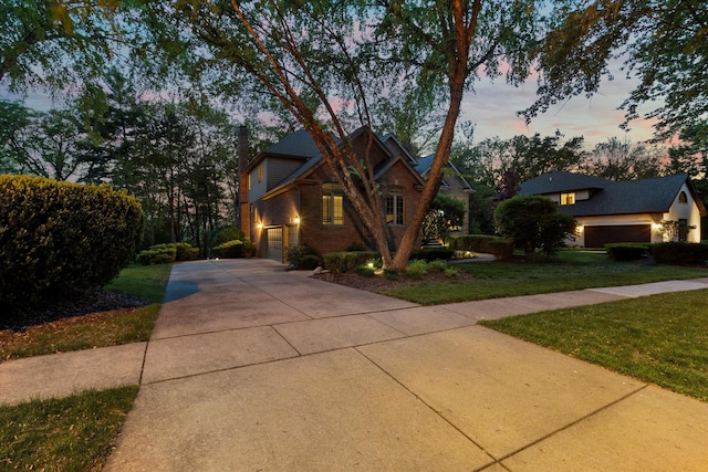 1396 Notre Dame Dr, Lemont, IL 60439 - view of front of house featuring concrete driveway, a front yard, and a garage