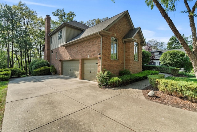 1396 Notre Dame Dr, Lemont, IL 60439 - view of home's exterior with brick siding, a chimney, driveway, and roof with shingles