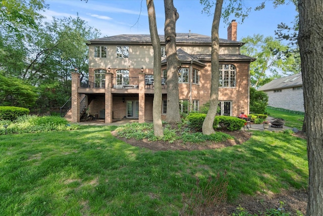 1396 Notre Dame Dr, Lemont, IL 60439 - rear view of property with a wooden deck, an outdoor fire pit, a yard, and stairs