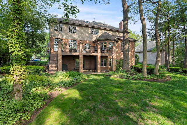 1396 Notre Dame Dr, Lemont, IL 60439 - back of house with brick siding, a chimney, a yard, and a deck