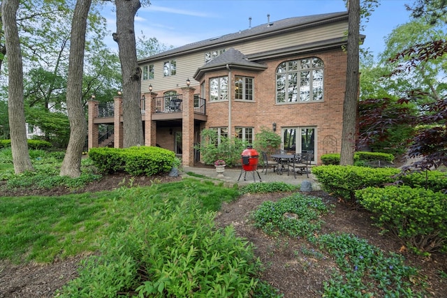 1396 Notre Dame Dr, Lemont, IL 60439 - back of house with brick siding and a patio area