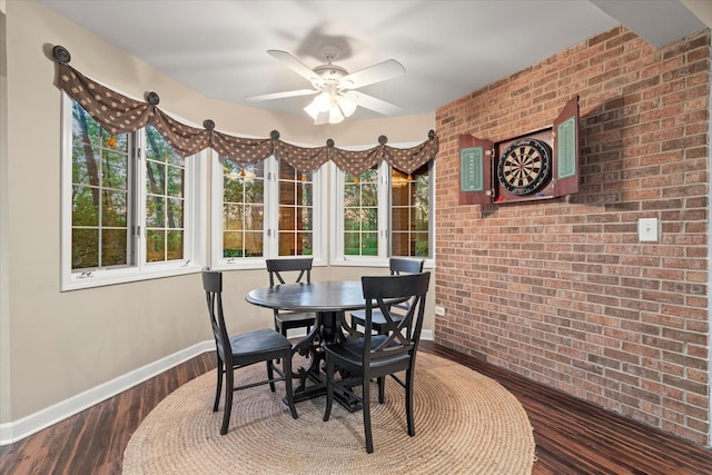 1396 Notre Dame Dr, Lemont, IL 60439 - dining room featuring brick wall, a ceiling fan, and wood finished floors