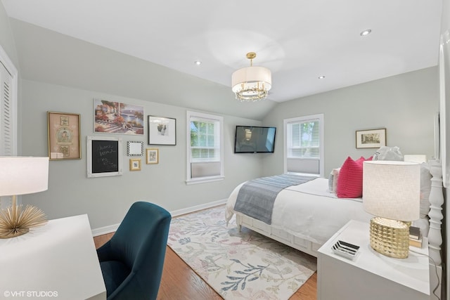 2236 Birchwood Ave, Wilmette, IL 60091 - bedroom featuring a chandelier, wood finished floors, lofted ceiling, and recessed lighting