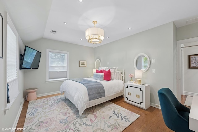 2236 Birchwood Ave, Wilmette, IL 60091 - bedroom with wood finished floors, a chandelier, recessed lighting, and vaulted ceiling