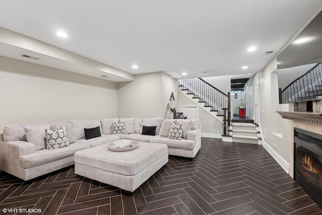 2236 Birchwood Ave, Wilmette, IL 60091 - living area with stairs, a glass covered fireplace, and recessed lighting