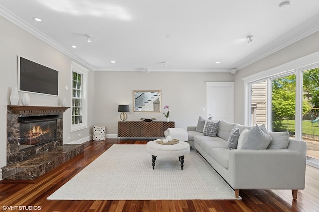 2236 Birchwood Ave, Wilmette, IL 60091 - living room with healthy amount of natural light, crown molding, wood finished floors, a high end fireplace, and recessed lighting