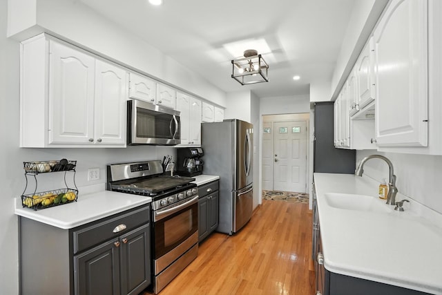 7855 Silver Ct, Orland Park, IL 60462 - kitchen featuring stainless steel appliances, white cabinets, recessed lighting, and gray cabinets