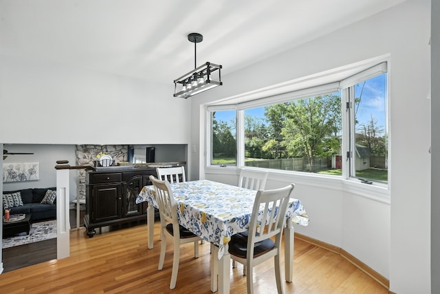 7855 Silver Ct, Orland Park, IL 60462 - dining area featuring light wood finished floors and a chandelier