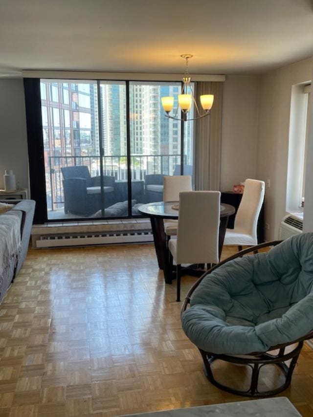 345 N Canal St Unit 1204, Chicago, IL 60606 - dining room with a chandelier, plenty of natural light, and a baseboard heating unit