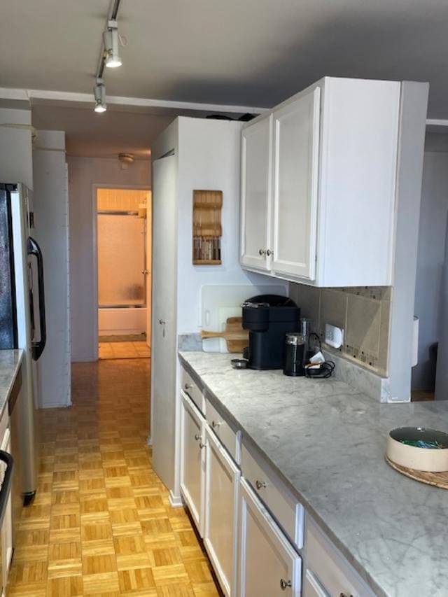 345 N Canal St Unit 1204, Chicago, IL 60606 - kitchen featuring white cabinetry and light stone countertops