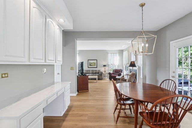 1128 Teasel Ln, Naperville, IL 60564 - dining room with light wood finished floors, a chandelier, recessed lighting, and built in study area