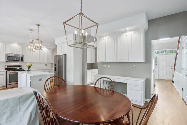 1128 Teasel Ln, Naperville, IL 60564 - dining room featuring a chandelier