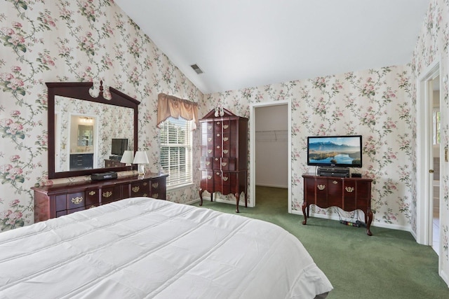 1128 Teasel Ln, Naperville, IL 60564 - carpeted bedroom with wallpapered walls, vaulted ceiling, a walk in closet, and a closet