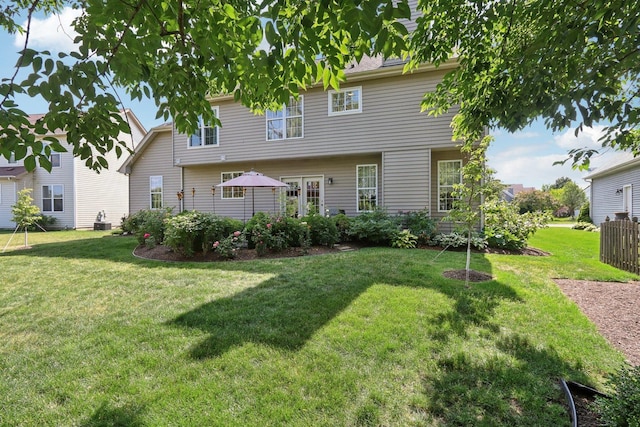 1128 Teasel Ln, Naperville, IL 60564 - back of house with a lawn