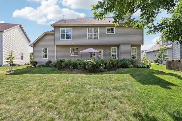 1128 Teasel Ln, Naperville, IL 60564 - rear view of property featuring a yard
