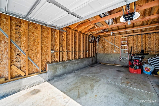 1165 Morton Ave, Elgin, IL 60120 - garage featuring a garage door opener