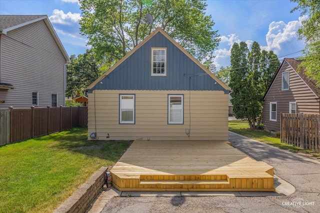 1165 Morton Ave, Elgin, IL 60120 - rear view of property with a deck and board and batten siding