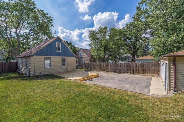 1165 Morton Ave, Elgin, IL 60120 - view of yard featuring a deck and a patio