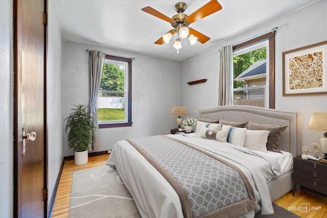 1165 Morton Ave, Elgin, IL 60120 - bedroom with wood finished floors and a ceiling fan