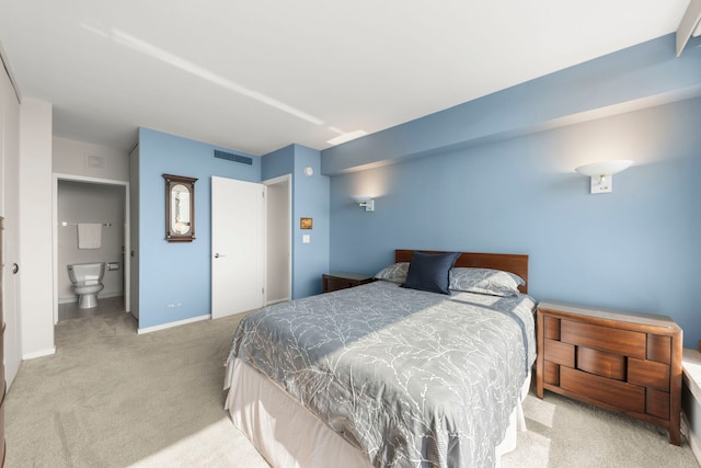 3200 N Lake Shore Dr N Unit 1910, Chicago, IL 60657 - carpeted bedroom with baseboards and connected bathroom