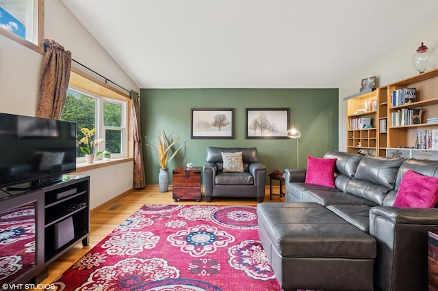 25 W Jeffery Ave, Wheeling, IL 60090 - living area featuring light wood-style floors and lofted ceiling