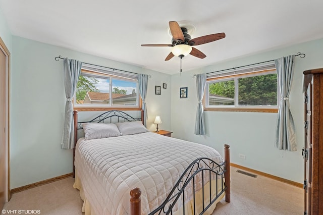 25 W Jeffery Ave, Wheeling, IL 60090 - bedroom with light carpet and ceiling fan