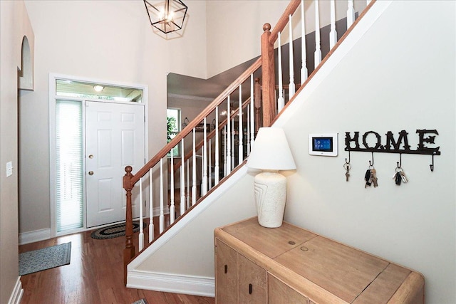 768 W St Johns Pl, Addison, IL 60101 - entryway featuring stairs, wood finished floors, and a high ceiling